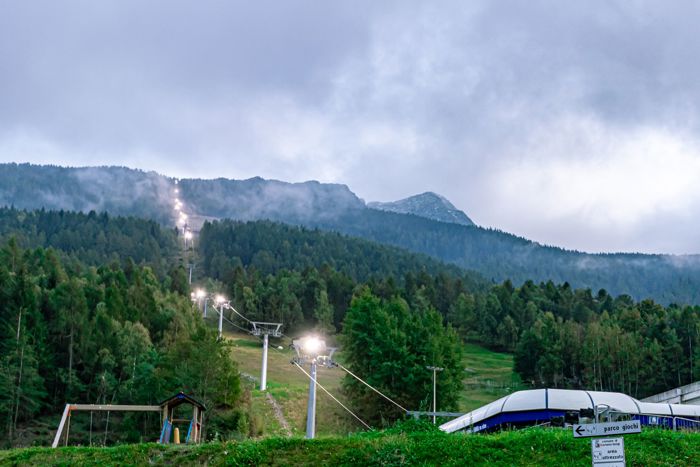 LED lighting sport | skiing view with cableway and mountain Ski Piste Aprica